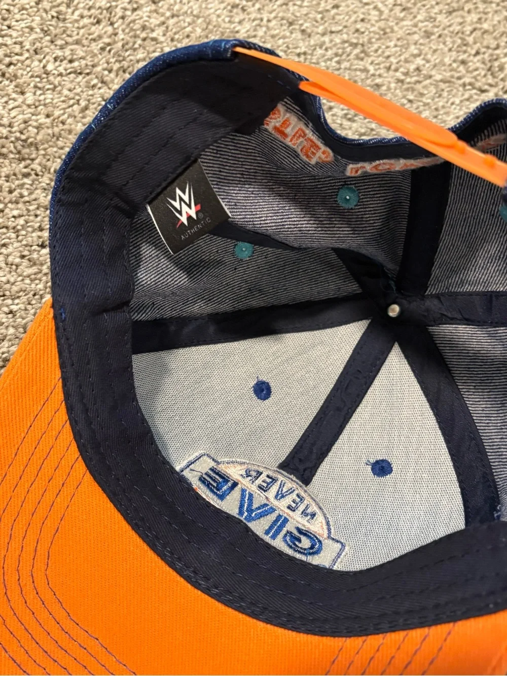 John Cena WWE Never Give Up Blue & Orange Trucker Hat